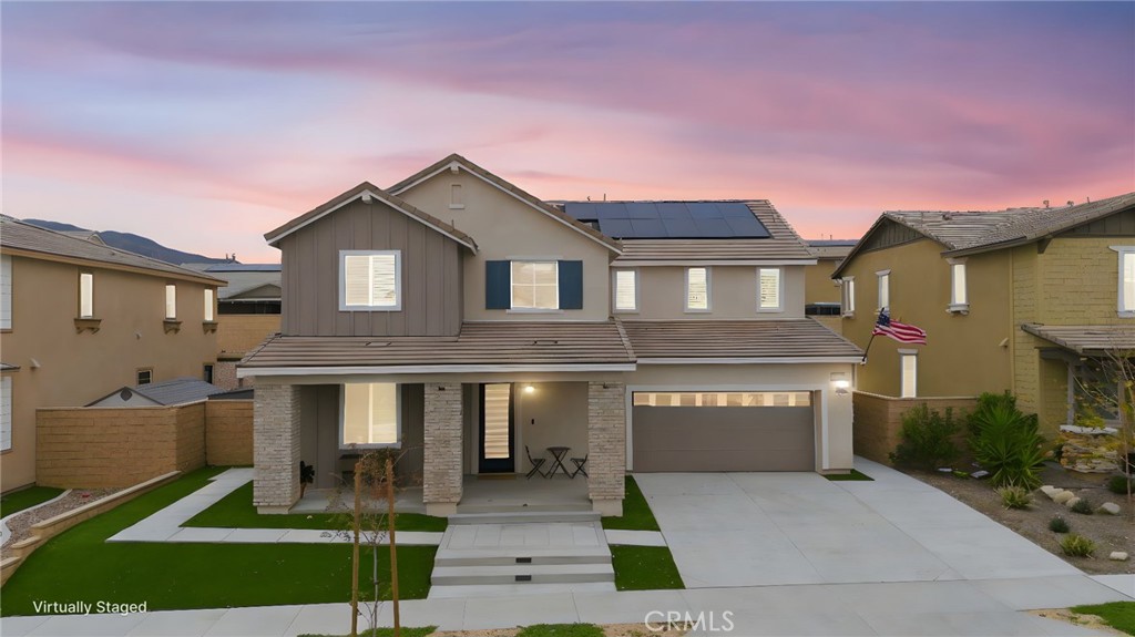 16770 Tea Tree Lane Fontana, CA 92336 - Photo 1 of 1 a front view of a house with a yard and a garage