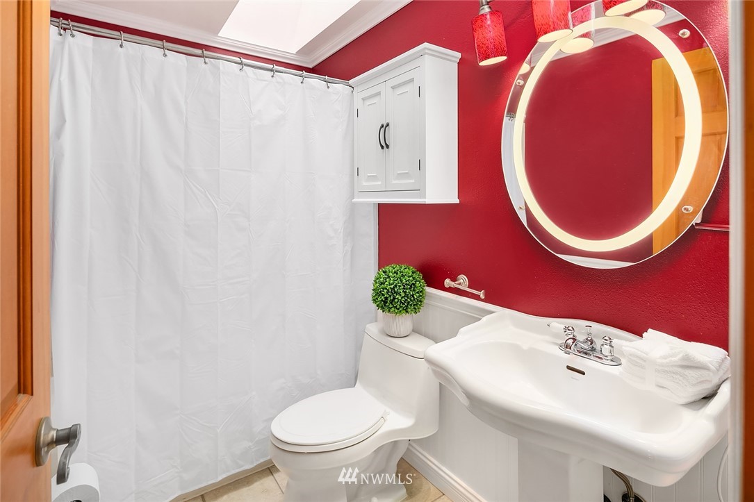2526 Mill Avenue South Renton, WA 98055 - Photo 13 of 33 a bathroom with a sink and a mirror