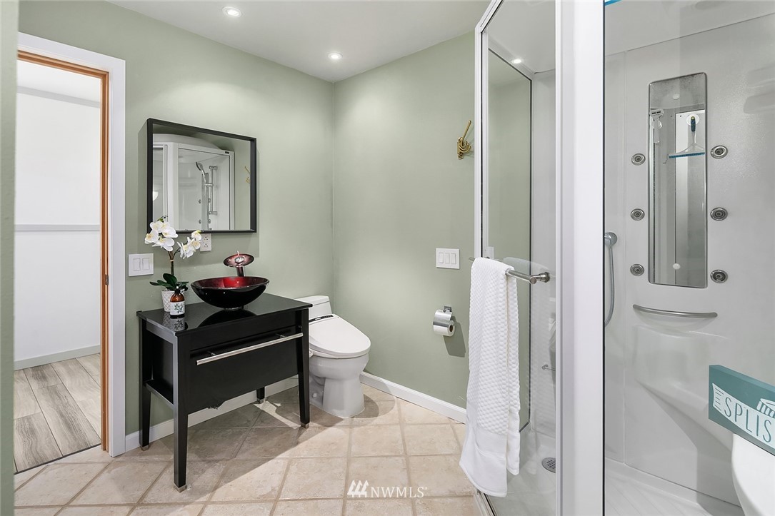 2526 Mill Avenue South Renton, WA 98055 - Photo 18 of 33 a bathroom with a toilet sink and shower
