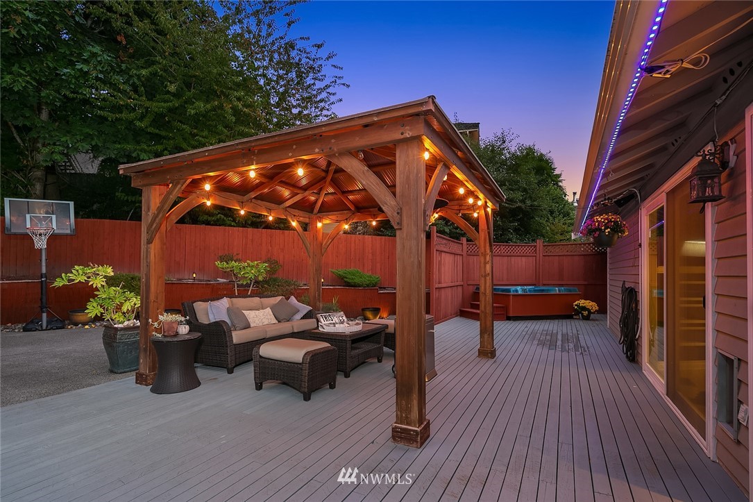 2526 Mill Avenue South Renton, WA 98055 - Photo 22 of 33 a view of a patio with couches under an umbrella