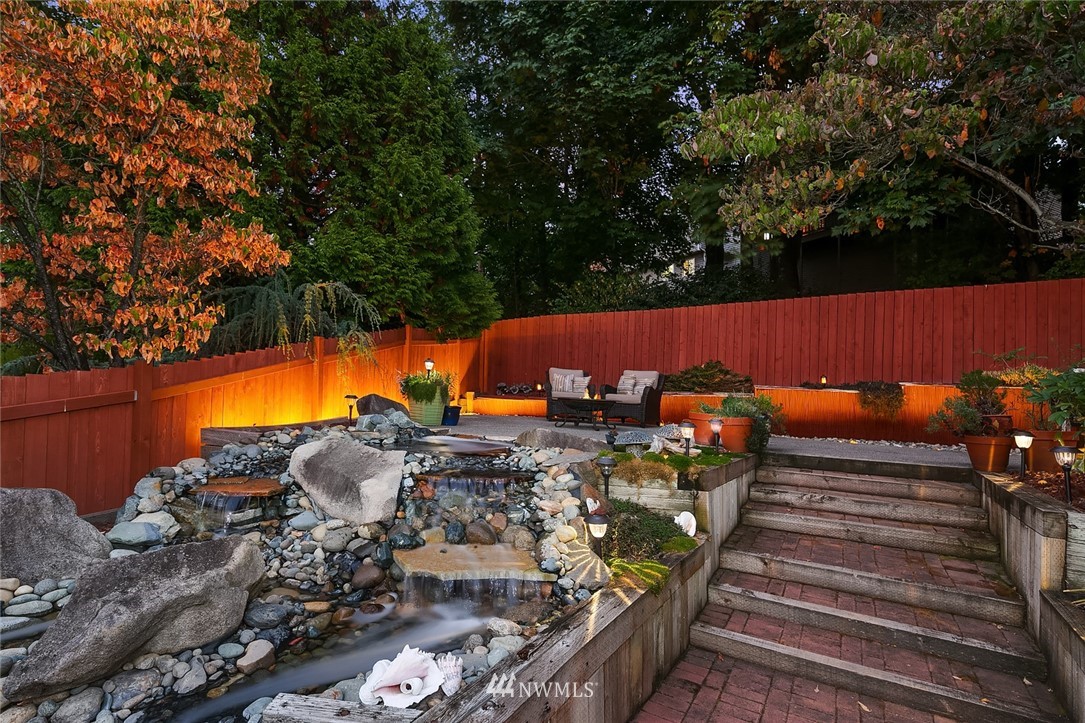 2526 Mill Avenue South Renton, WA 98055 - Photo 25 of 33 a view of a swimming pool with a patio and a backyard