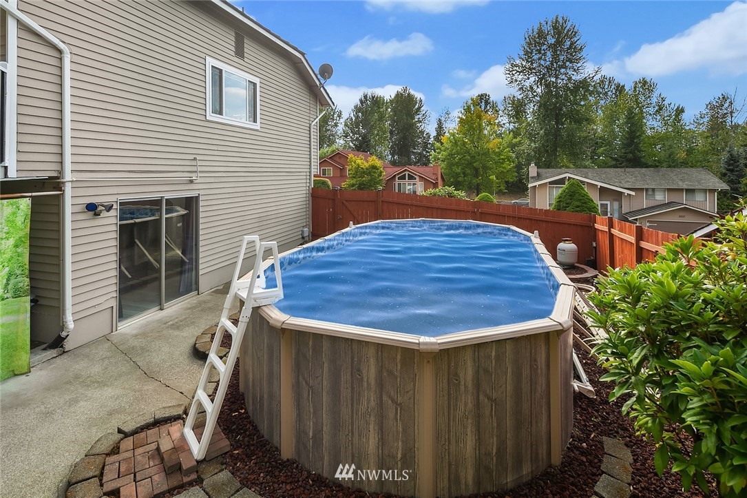 2526 Mill Avenue South Renton, WA 98055 - Photo 30 of 33 a backyard of a house with table and chairs