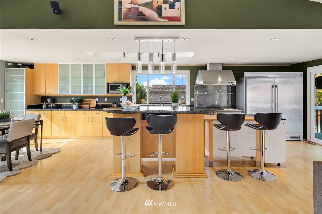 2526 Mill Avenue South Renton, WA 98055 - Photo 4 of 33 a kitchen with table and chairs