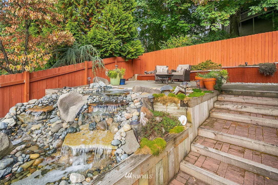 2526 Mill Avenue South Renton, WA 98055 - Photo 32 of 33 a view of a terrace with wooden floor and fence