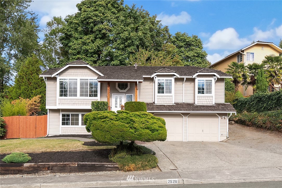 2526 Mill Avenue South Renton, WA 98055 - Photo 33 of 33 a front view of a house with garden