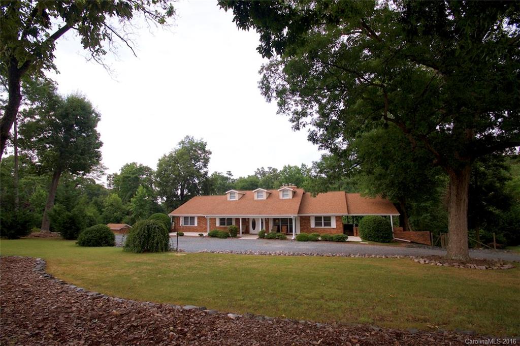 2005 Clontz Long Road Monroe, NC 28110 - Photo 1 of 24 a front view of a house with garden