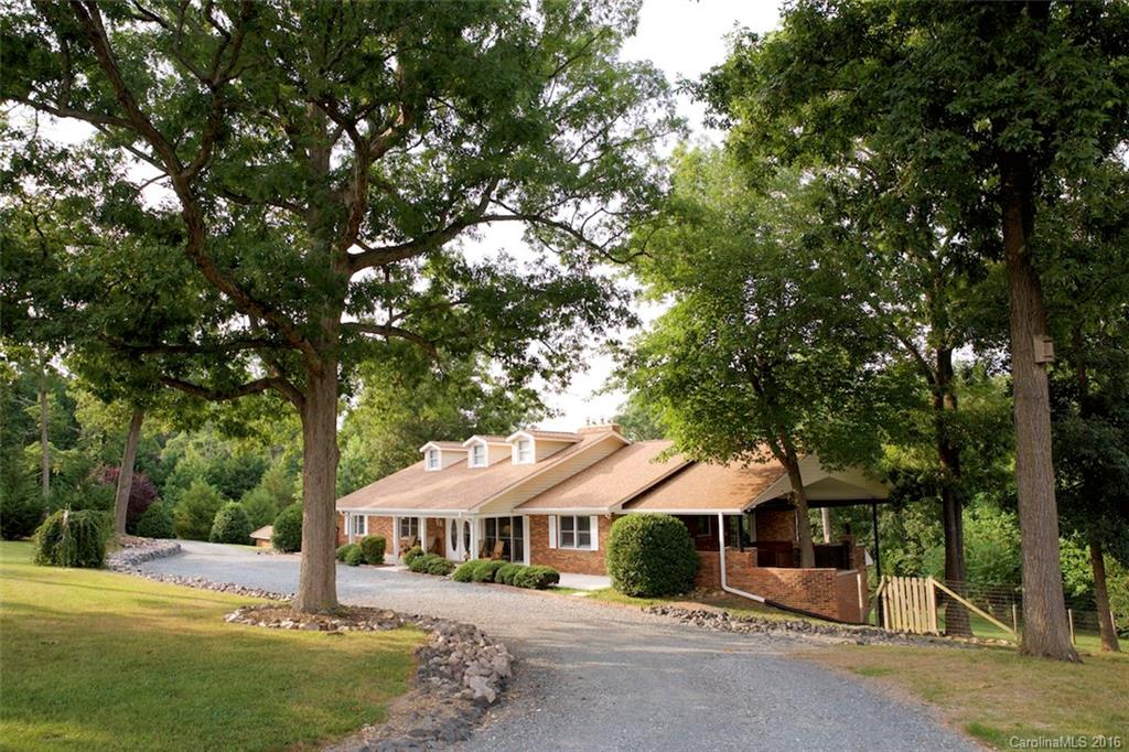 2005 Clontz Long Road Monroe, NC 28110 - Photo 2 of 24 a front view of a house with a garden