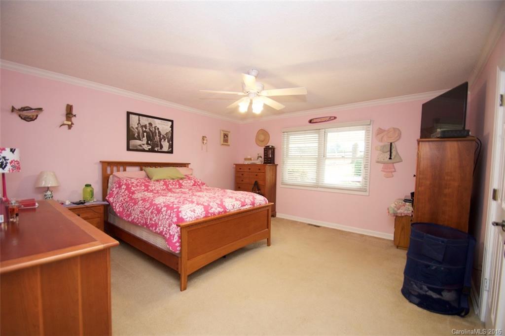 2005 Clontz Long Road Monroe, NC 28110 - Photo 17 of 24 a bedroom with a bed and a window