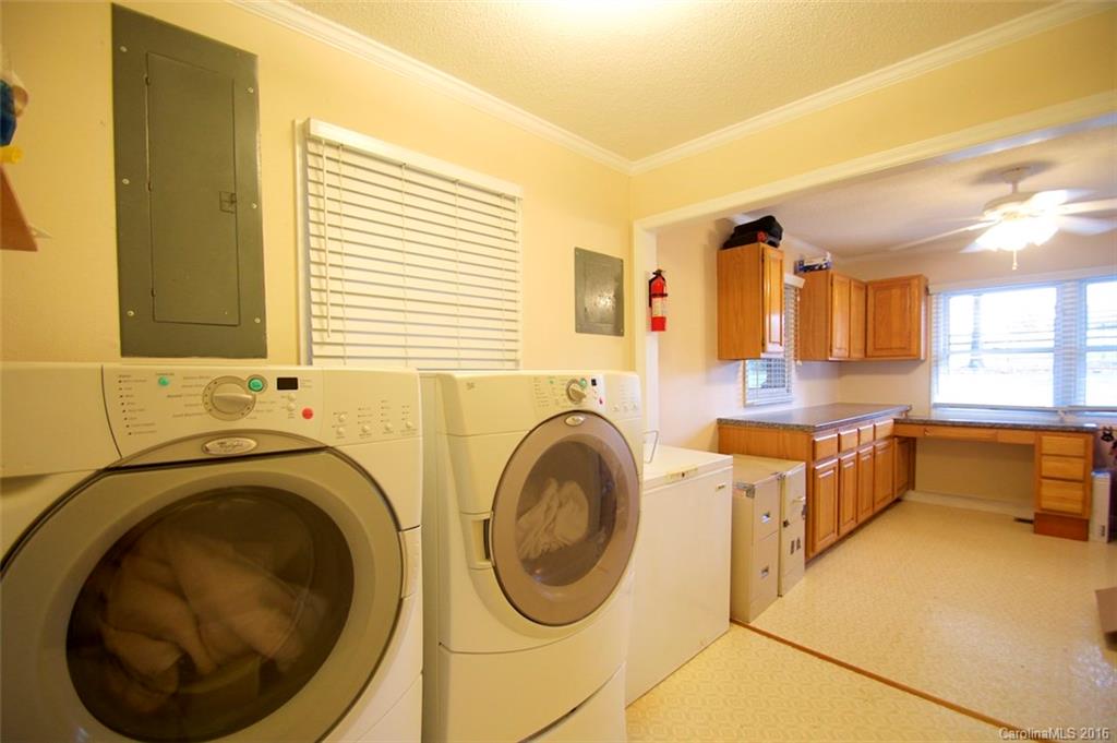 2005 Clontz Long Road Monroe, NC 28110 - Photo 19 of 24 a utility room with sink dryer and washer