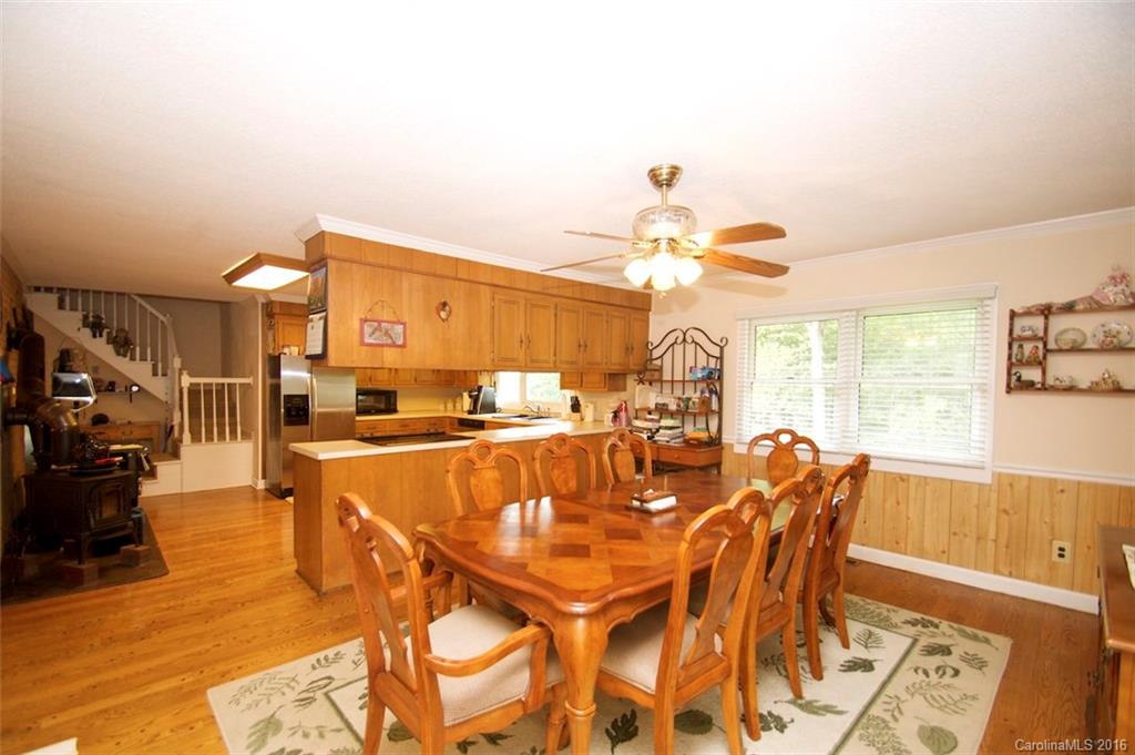 2005 Clontz Long Road Monroe, NC 28110 - Photo 7 of 24 a view of a dining room with furniture and wooden floor
