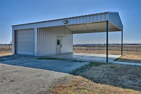 a view of a back yard of the house