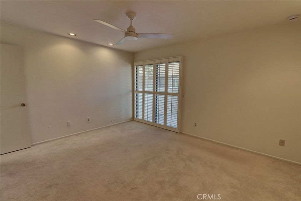 8566 Larkhall Circle, Unit 808A Huntington Beach, CA 92646 - Photo 17 of 46 a view of an empty room with a window
