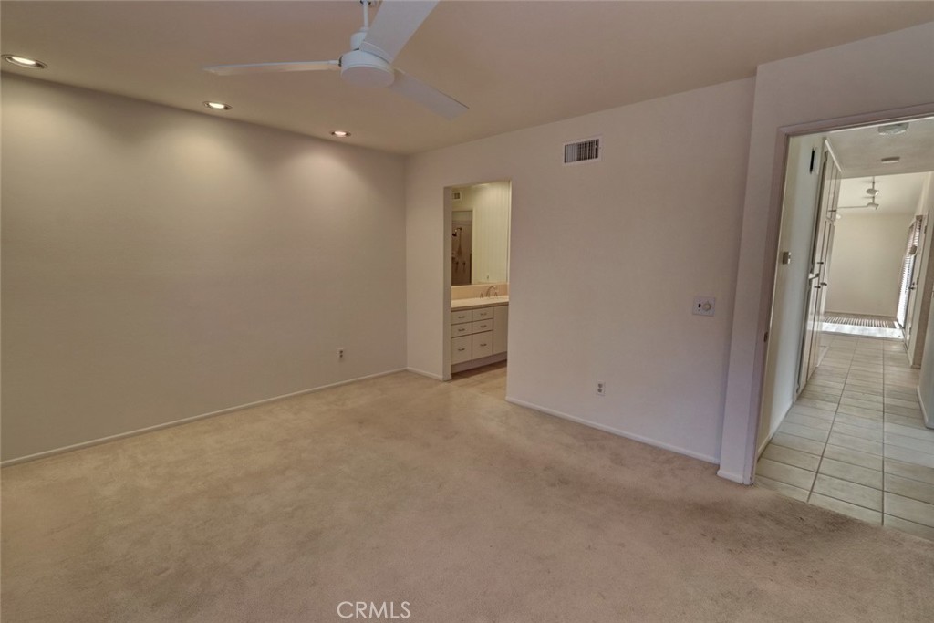 8566 Larkhall Circle, Unit 808A Huntington Beach, CA 92646 - Photo 18 of 46 a view of an empty room