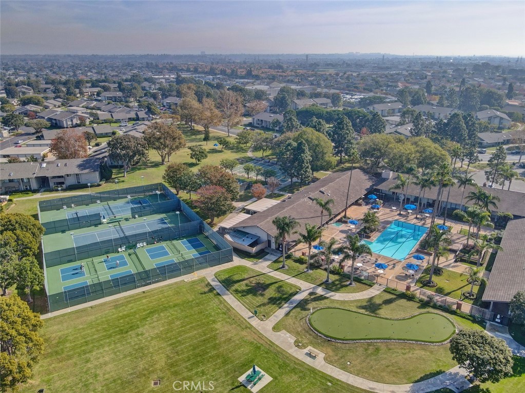 8566 Larkhall Circle, Unit 808A Huntington Beach, CA 92646 - Photo 28 of 46 an aerial view of residential houses with outdoor space