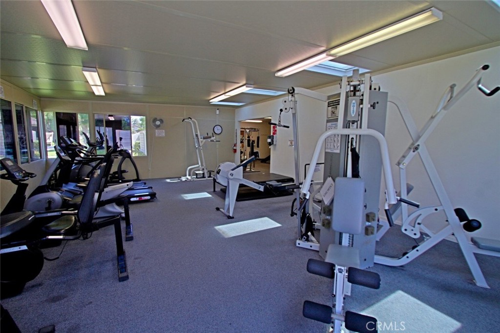 8566 Larkhall Circle, Unit 808A Huntington Beach, CA 92646 - Photo 39 of 46 a view of a room with gym equipment