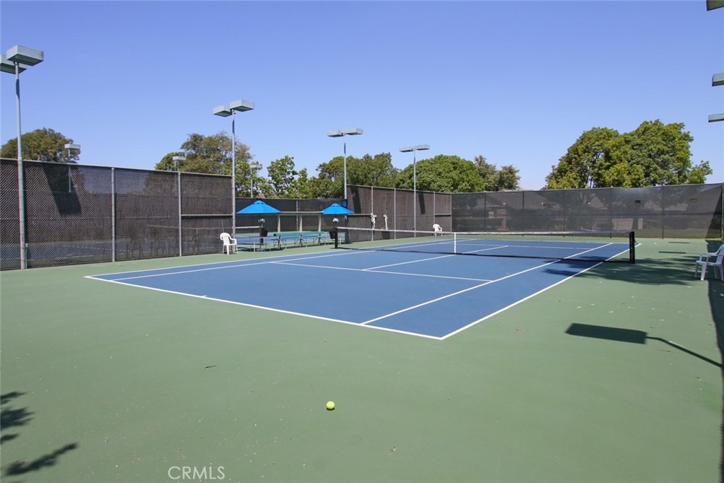 8566 Larkhall Circle, Unit 808A Huntington Beach, CA 92646 - Photo 42 of 46 a view of a tennis court