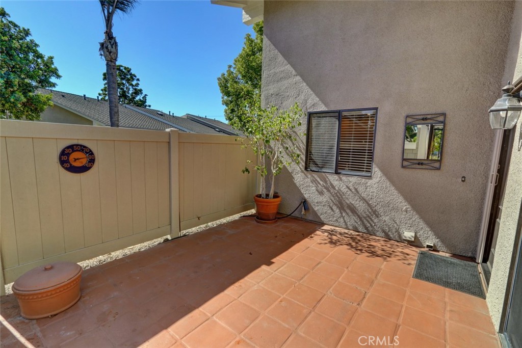 8566 Larkhall Circle, Unit 808A Huntington Beach, CA 92646 - Photo 7 of 46 a backyard of a house