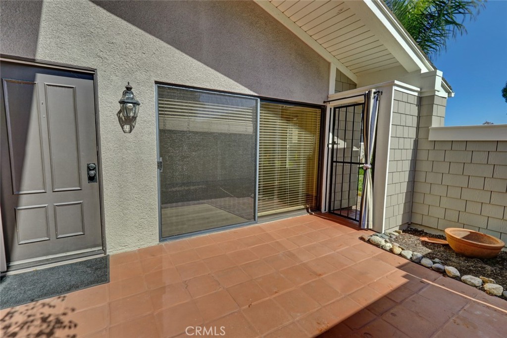 8566 Larkhall Circle, Unit 808A Huntington Beach, CA 92646 - Photo 9 of 46 a backyard of a house