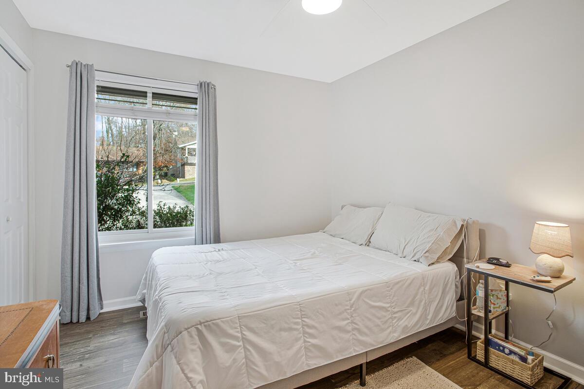 437 Kingwood Road Linthicum Heights, MD 21090 - Photo 20 of 38 a bedroom with a bed and a window