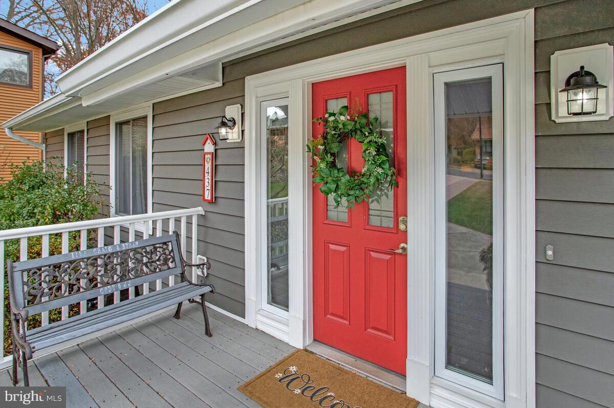 437 Kingwood Road Linthicum Heights, MD 21090 - Photo 2 of 38 a view of a porch with a bench