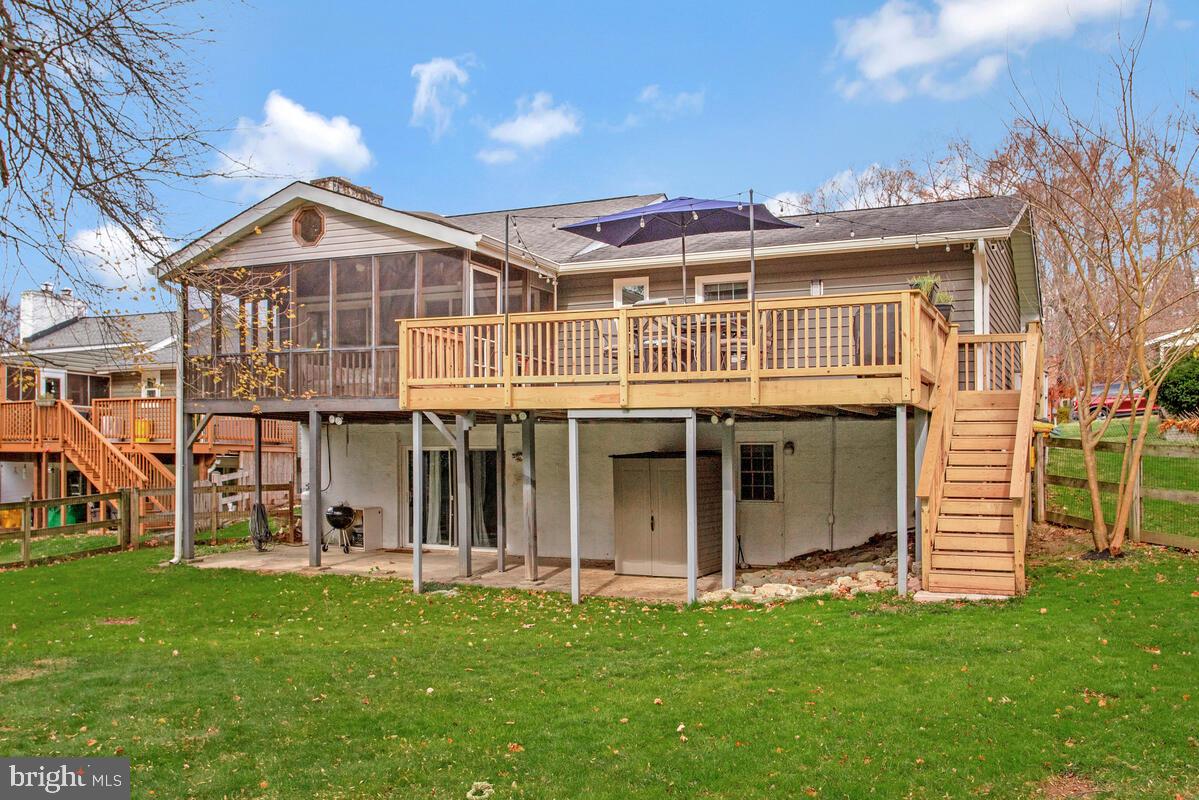 437 Kingwood Road Linthicum Heights, MD 21090 - Photo 33 of 38 a view of a house with a garden and deck