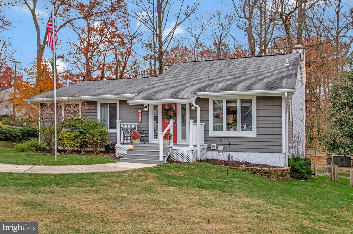 437 Kingwood Road Linthicum Heights, MD 21090 - Photo 36 of 38 a front view of a house with garden