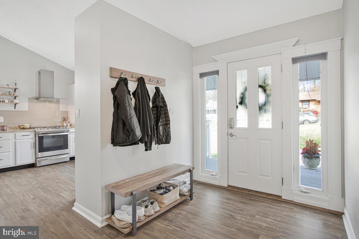437 Kingwood Road Linthicum Heights, MD 21090 - Photo 4 of 38 a view of walk in closet with clothes and shoes