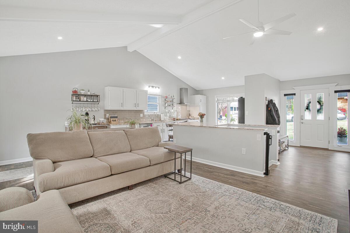 437 Kingwood Road Linthicum Heights, MD 21090 - Photo 6 of 38 a living room with furniture and kitchen view