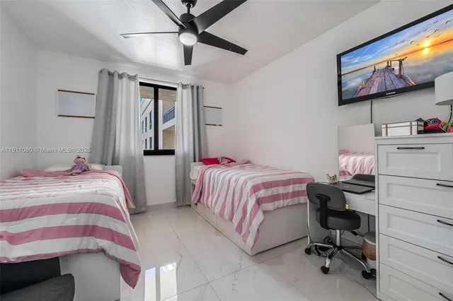 a bedroom with a bed and furniture