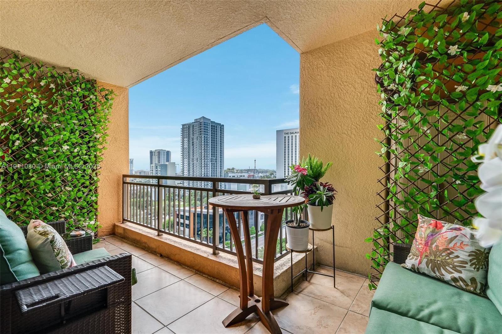 100 North Federal Highway, Unit 1413 Fort Lauderdale, FL 33301 - Photo 18 of 33 a balcony with furniture and a potted plant