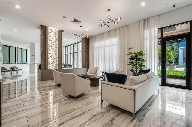 a big room with wooden floor and furniture