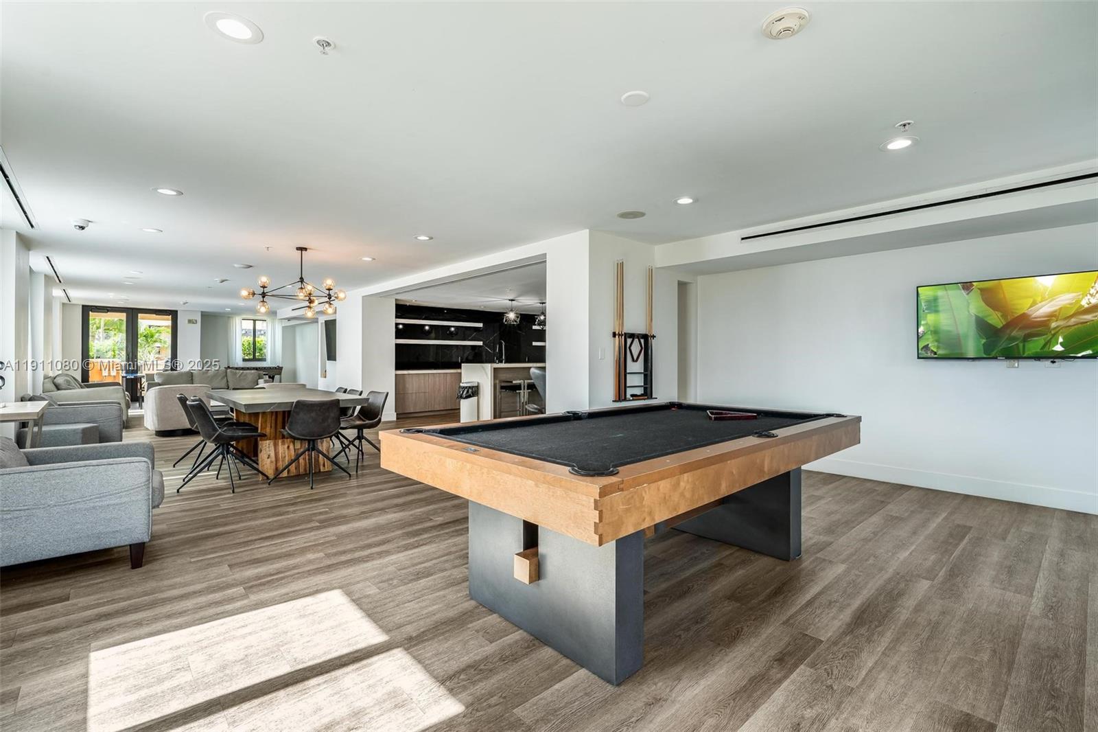 100 North Federal Highway, Unit 1413 Fort Lauderdale, FL 33301 - Photo 27 of 33 a view of kitchen with furniture and wooden floor