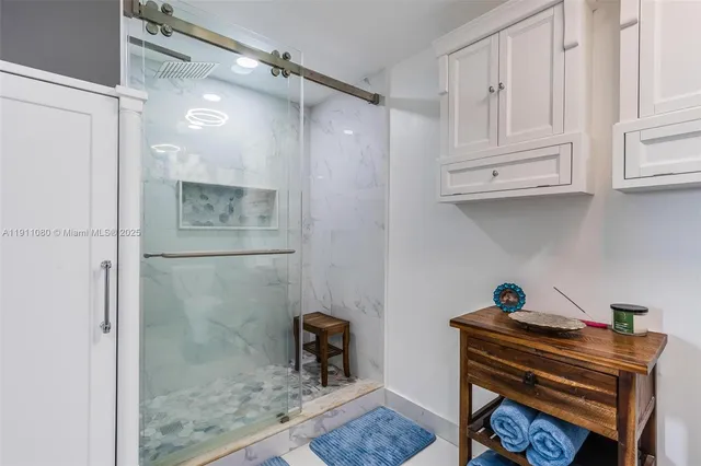 a room with cabinets and a wooden floor