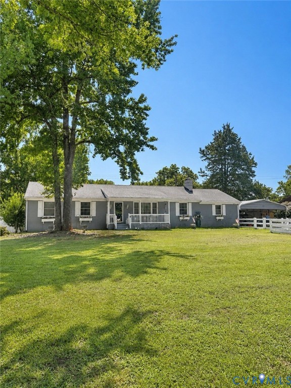 11241 Winterpock Road Chesterfield, VA 23838 - Photo 1 of 1 Expansive front lawn with mature trees, a covered