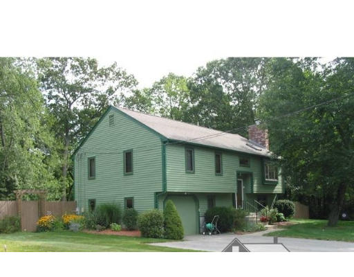 56 Little Farms Road Framingham, MA 01701 - Photo 1 of 4 a front view of a house with a yard