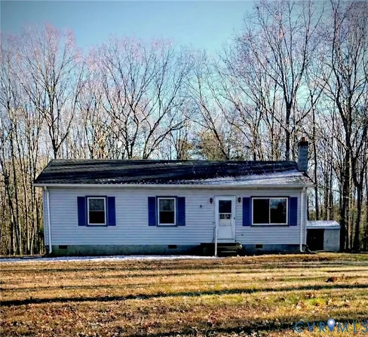 a view of front of house with a yard