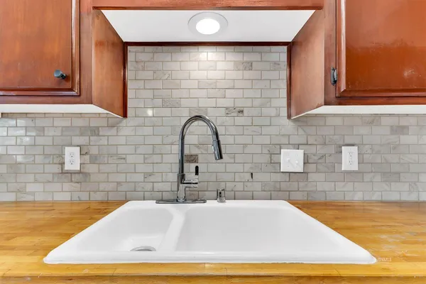a bathroom with a bathtub and shower