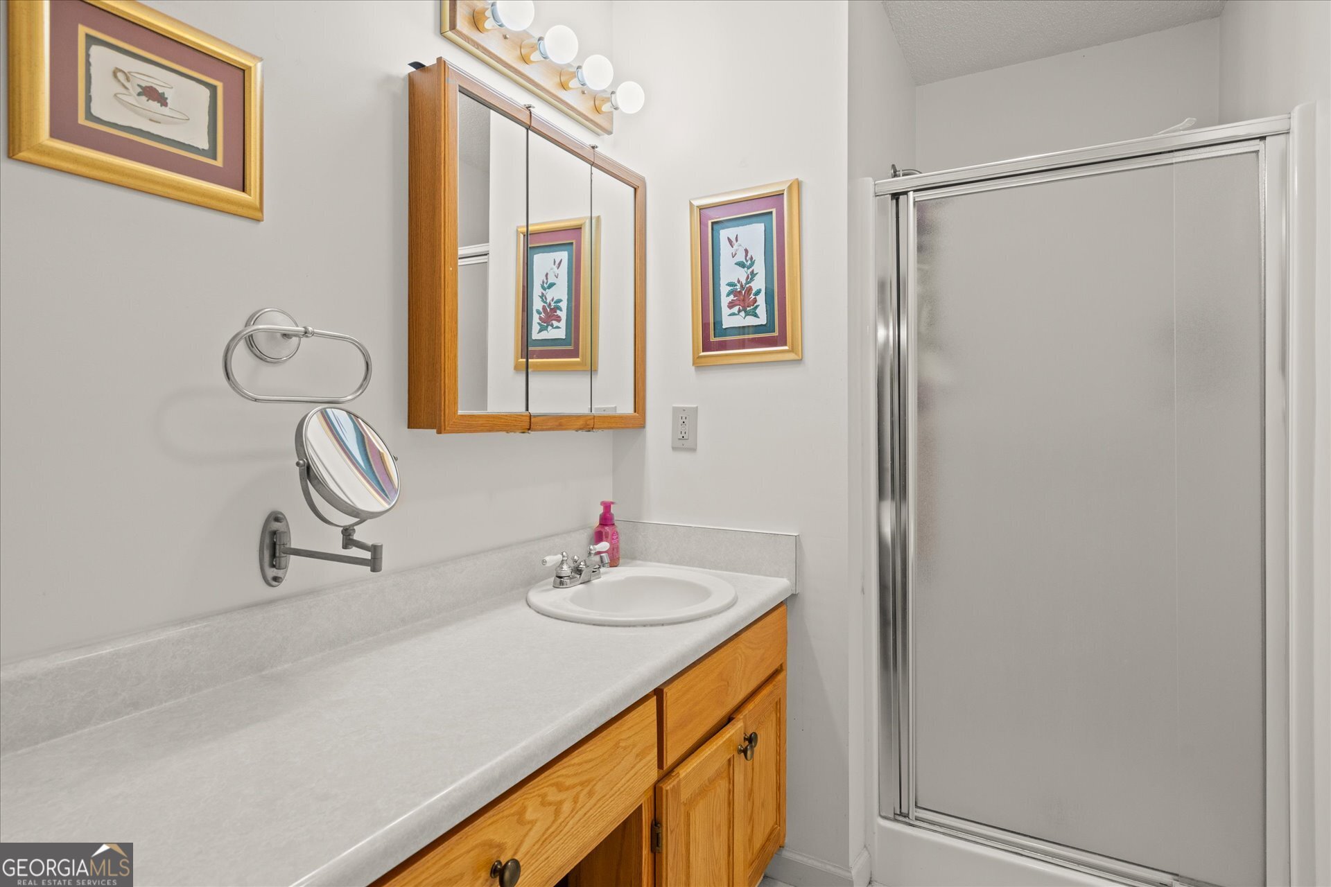 2643 Macedonia Road Franklin, GA 30217 - Photo 14 of 47 a bathroom with a sink and a mirror
