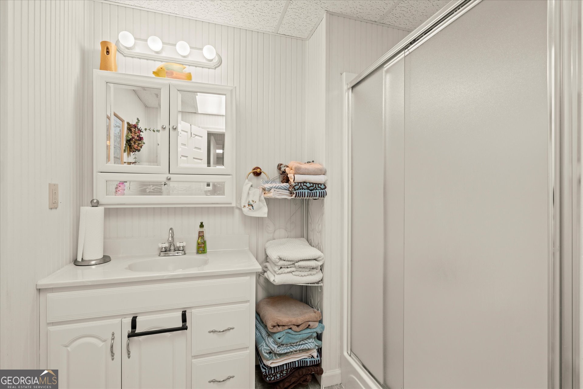 2643 Macedonia Road Franklin, GA 30217 - Photo 19 of 47 a bathroom with a sink and a mirror