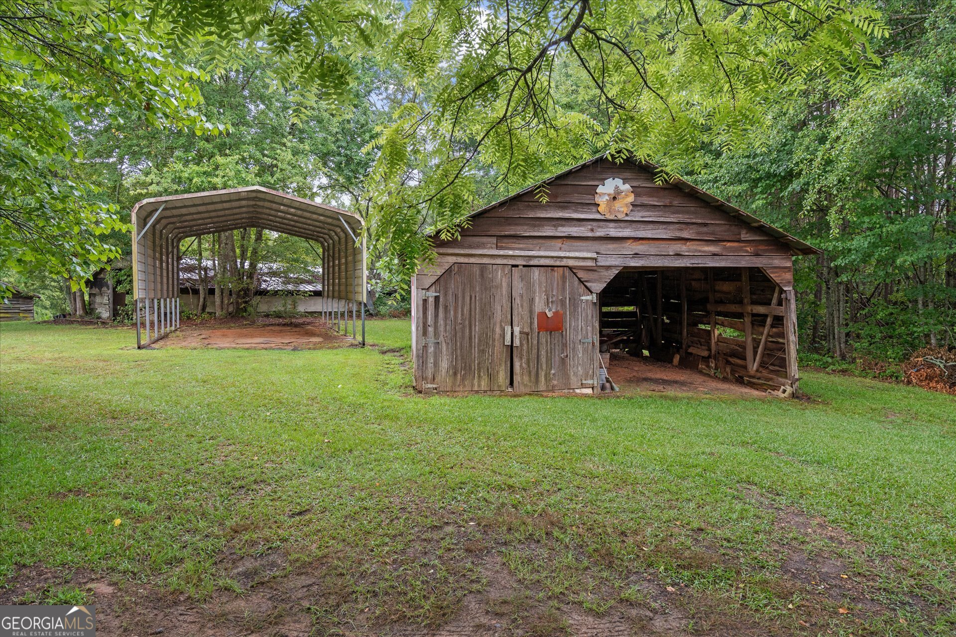 2643 Macedonia Road Franklin, GA 30217 - Photo 28 of 47 a front view of a house with garden