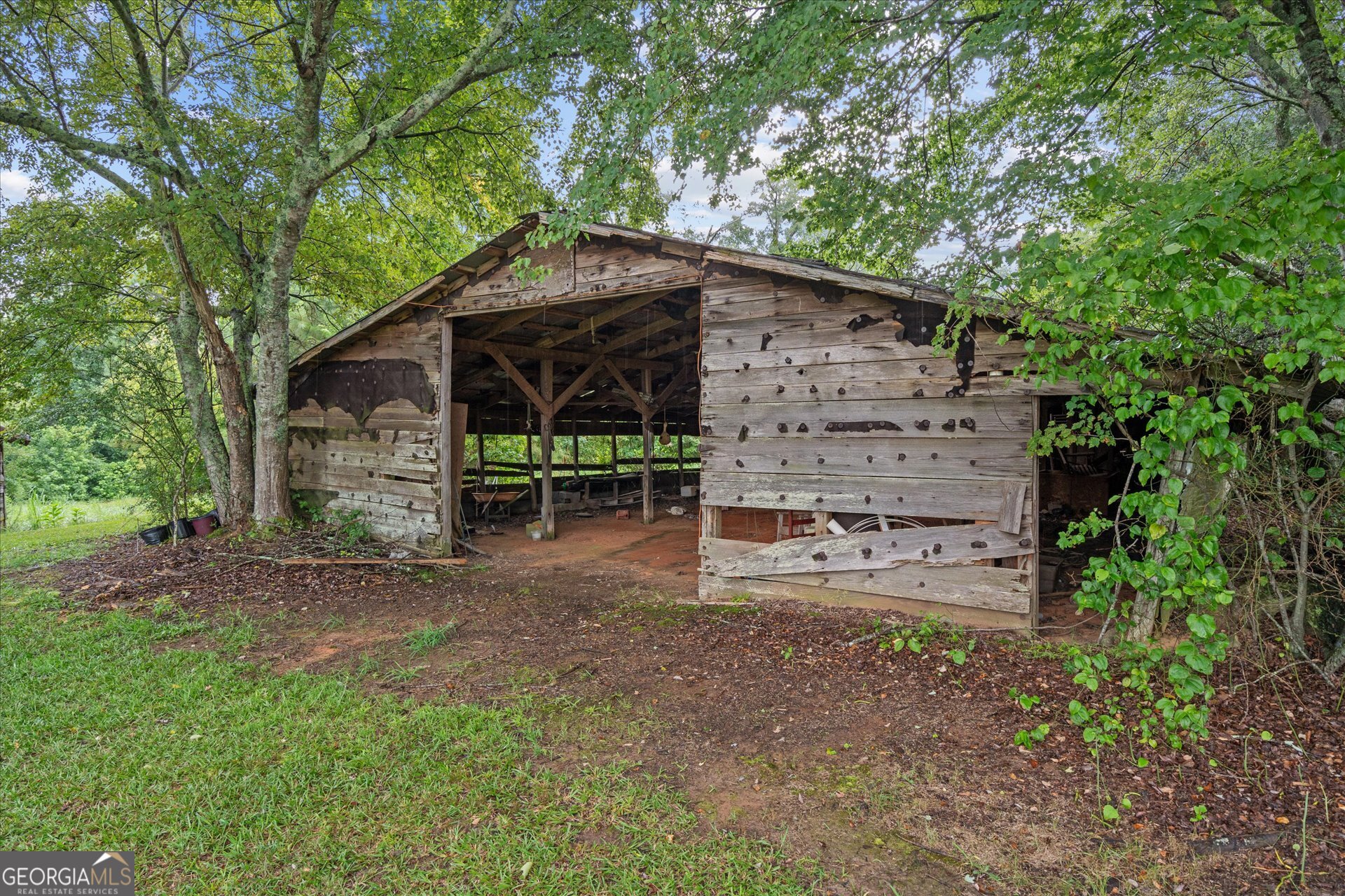 2643 Macedonia Road Franklin, GA 30217 - Photo 29 of 47 a view of a house with a yard