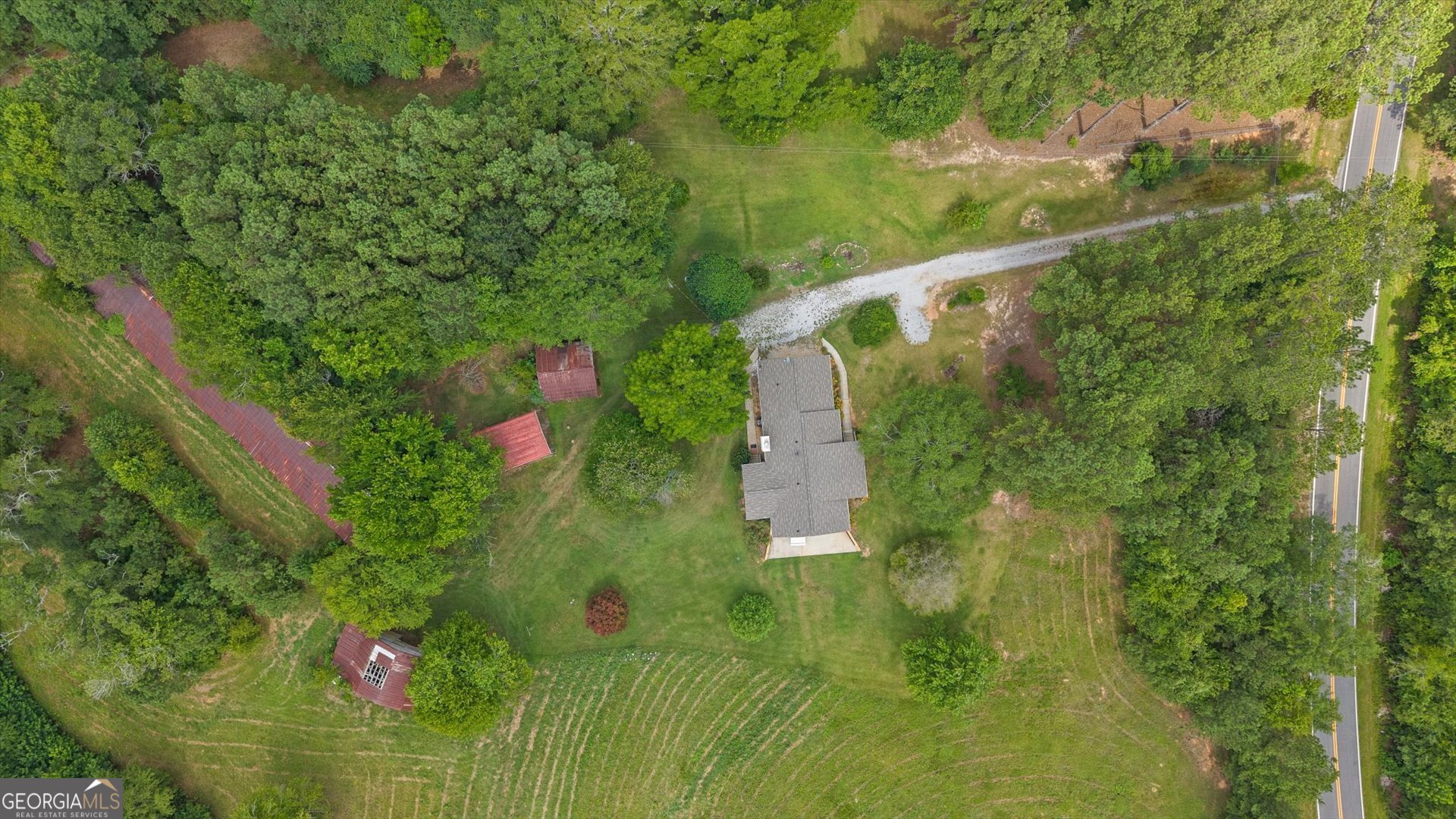 2643 Macedonia Road Franklin, GA 30217 - Photo 42 of 47 a view of a flower garden with a lake view