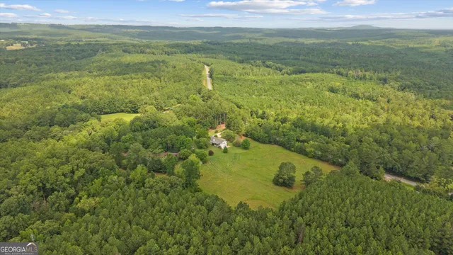 a view of a lake with a yard