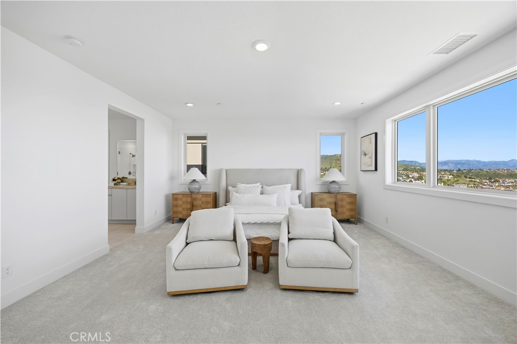 20138 Marlow Lane Porter Ranch, CA 91326 - Photo 21 of 39 a living room with furniture and a wall painting