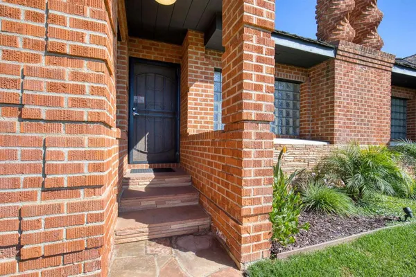 a view of a pathway with an empty room