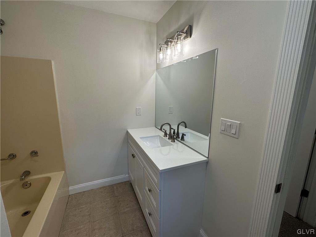 1204 Lakeside Drive Effort, PA 18330 - Photo 14 of 25 a bathroom with a sink and mirror with bathtub