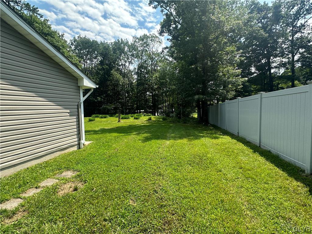 1204 Lakeside Drive Effort, PA 18330 - Photo 22 of 25 a view of a backyard with a small cabin