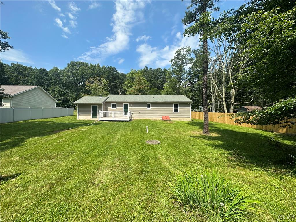 1204 Lakeside Drive Effort, PA 18330 - Photo 24 of 25 a front view of a house with yard and green space