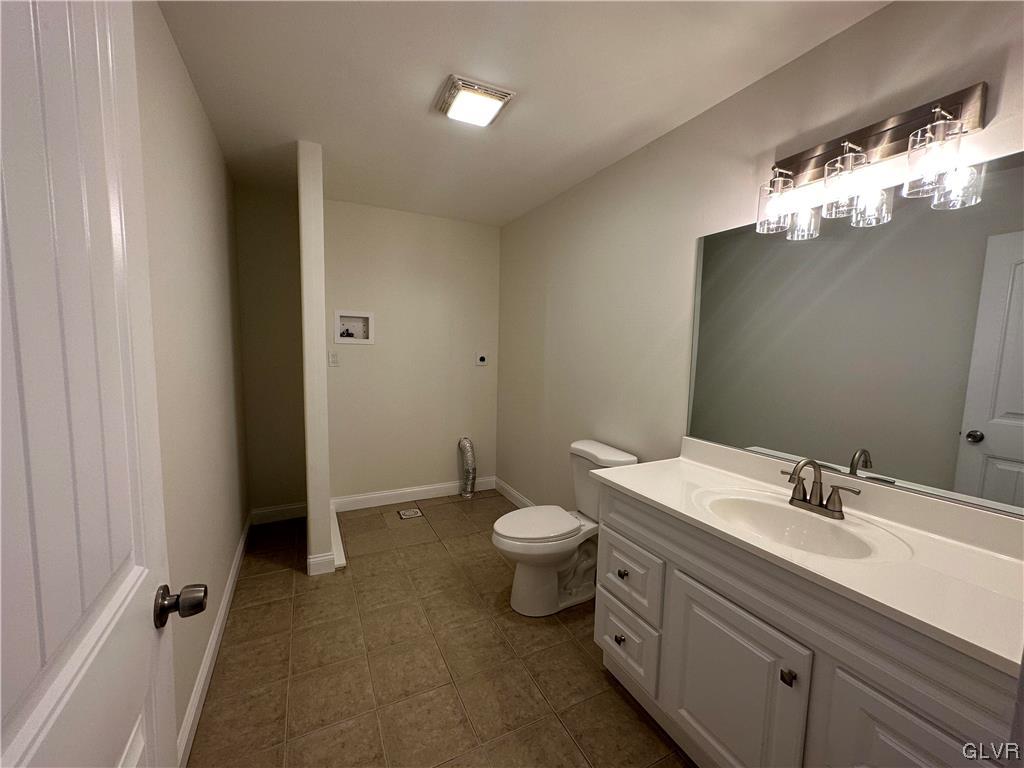 1204 Lakeside Drive Effort, PA 18330 - Photo 9 of 25 a bathroom with a double vanity sink and a toilet