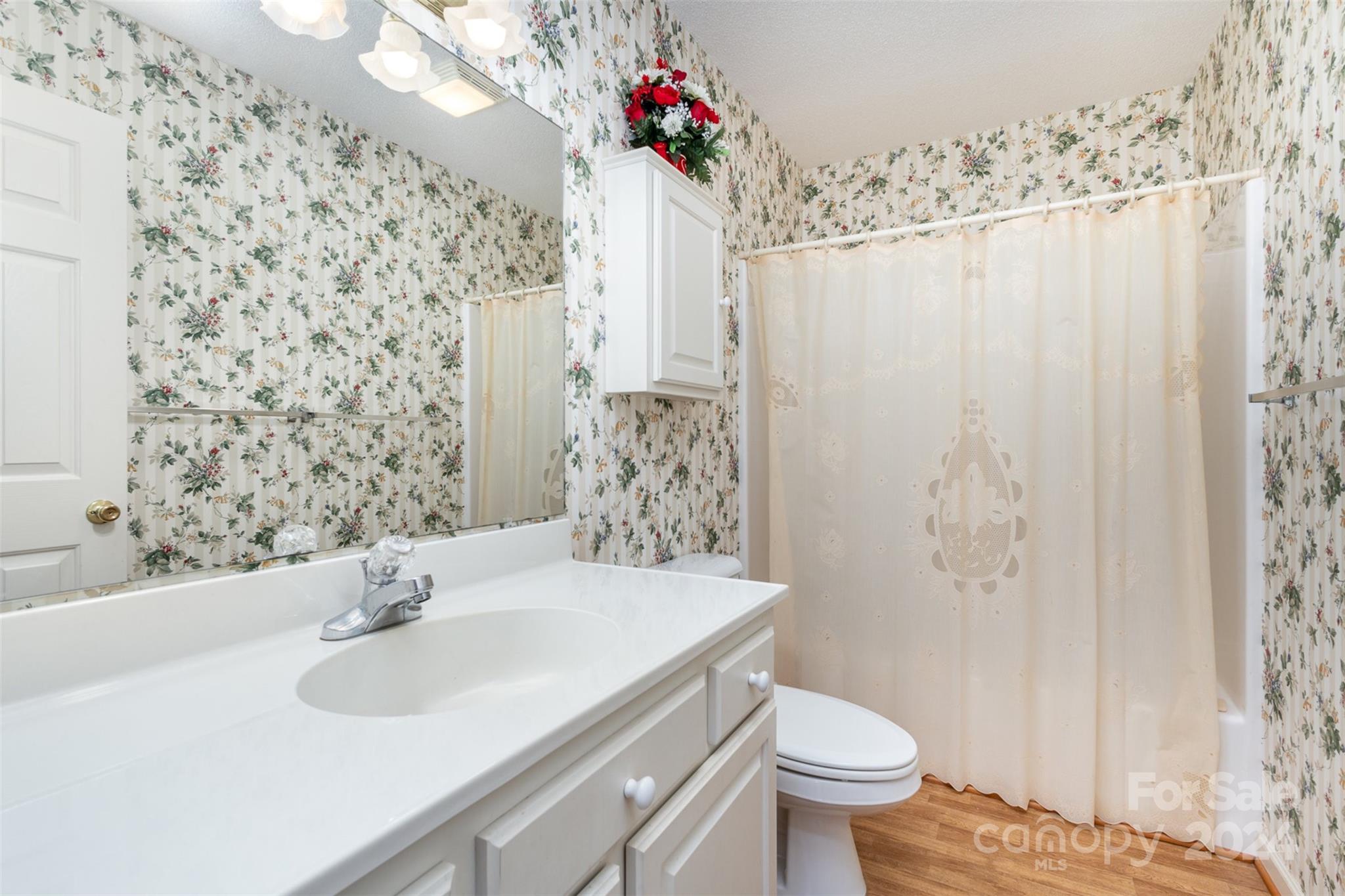 5306 Macedonia Church Road Vale, NC 28168 - Photo 22 of 35 a bathroom with a sink toilet and shower